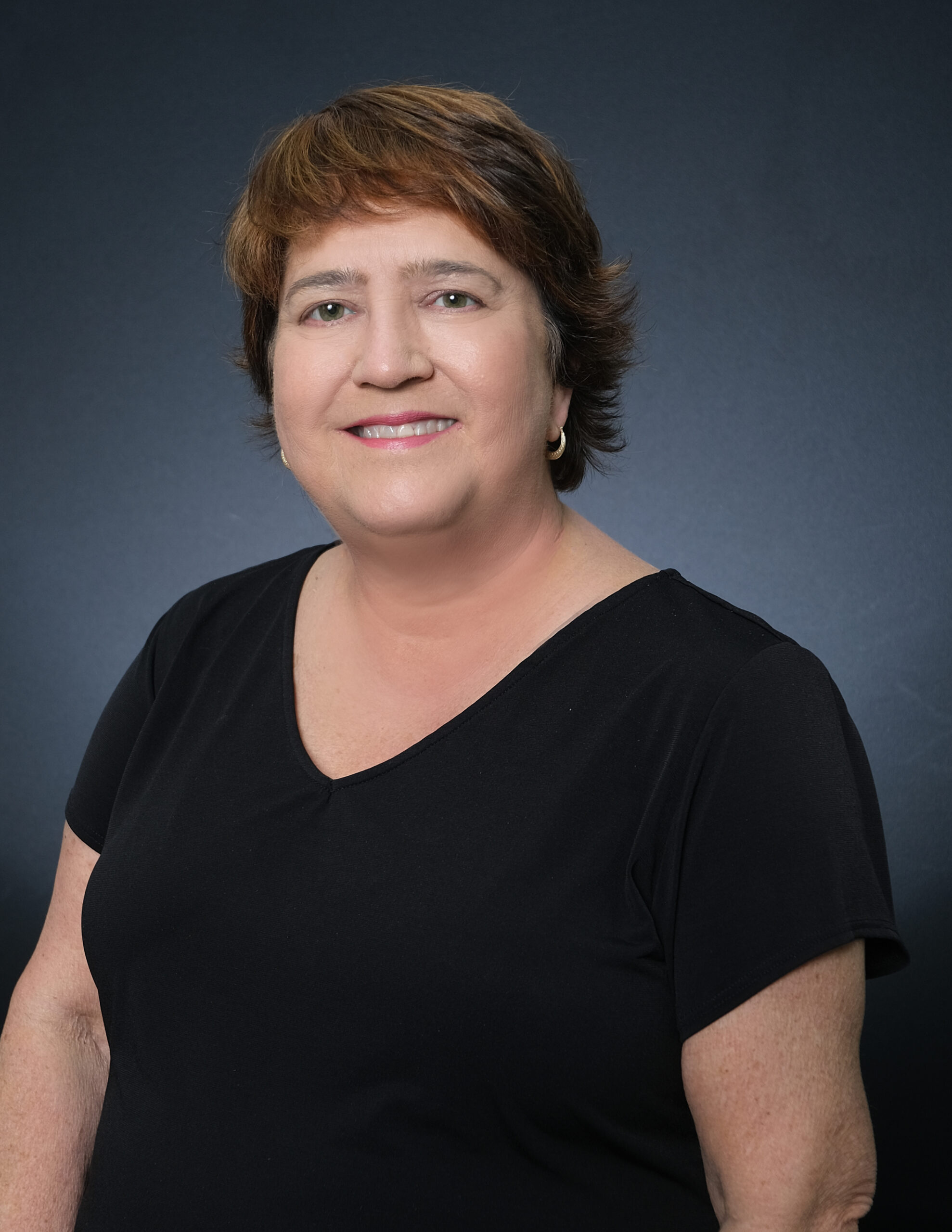 Cherie Chennault, real estate agent with Your Home Team ATL, professional headshot.